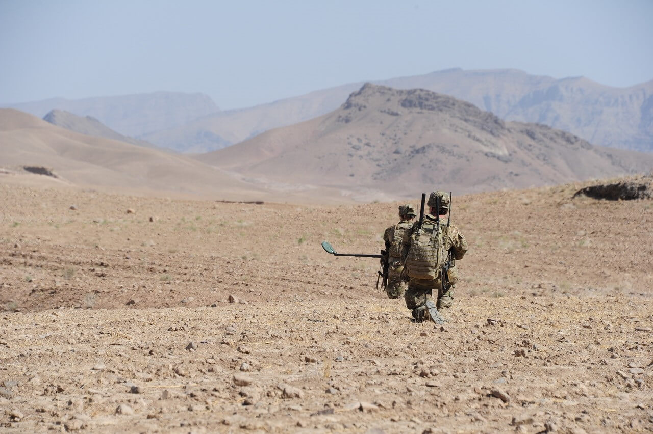 SPR Cassidy Burger and SPR Lindsey Albion during a search task in Uruzgan Province, 2013.